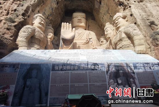 時(shí)下，中國(guó)“石窟鼻祖”天梯山石窟第13窟大佛足部與局部危巖體搶救性保護(hù)項(xiàng)目正在施工。圖為施工現(xiàn)場(chǎng)。陳曉斌 攝