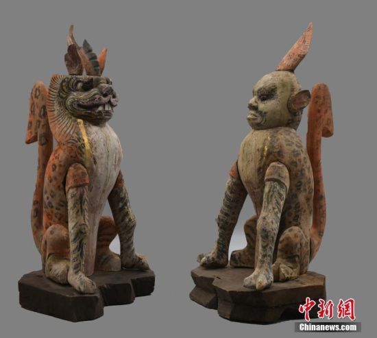 圖為慕容智墓出土鎮(zhèn)墓獸。 中新社發(fā) 甘肅省文物局 供圖